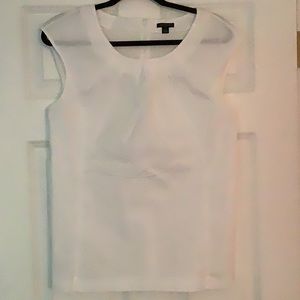 White sleeveless blouse